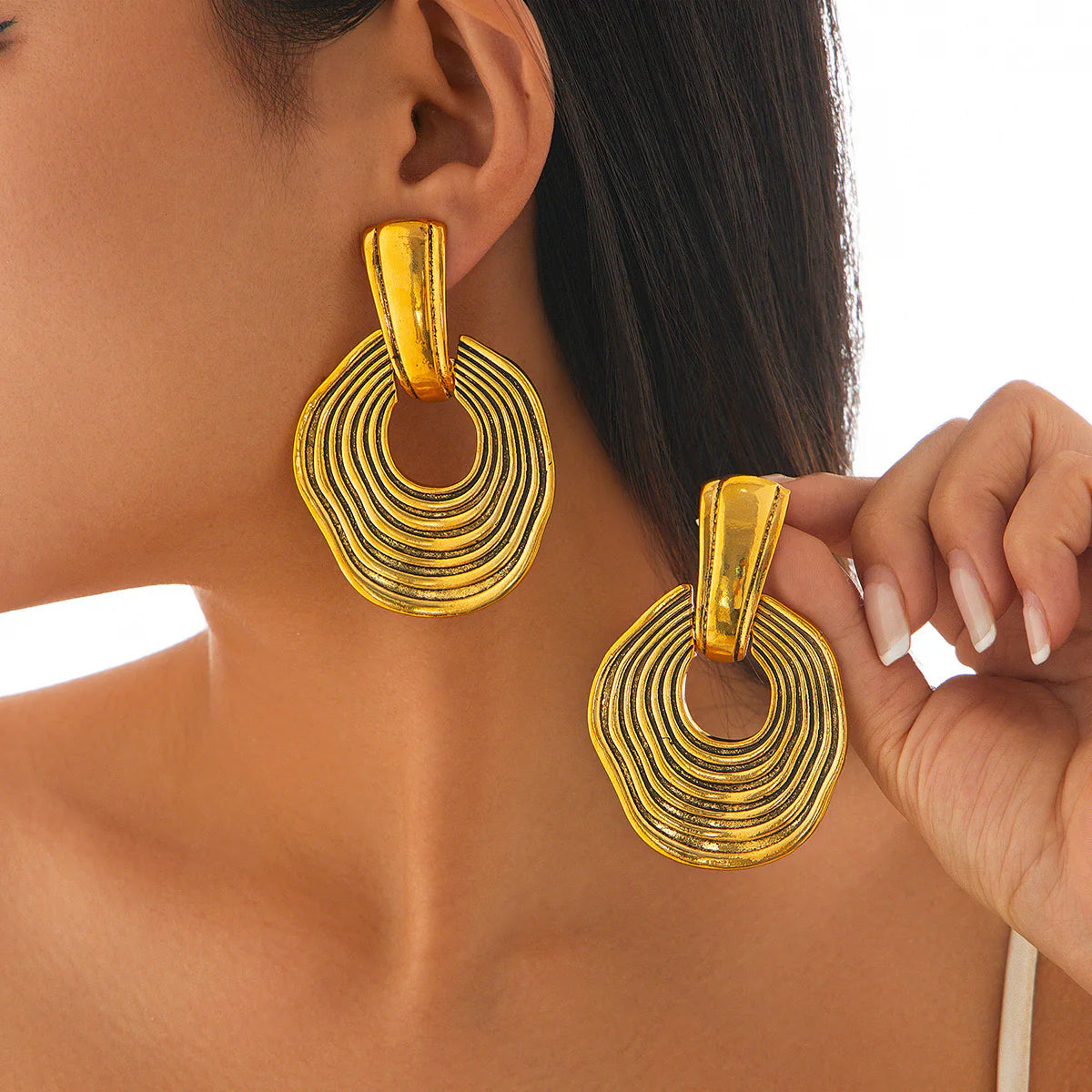 10 Styles of Earrings That Will Make You Look Younger