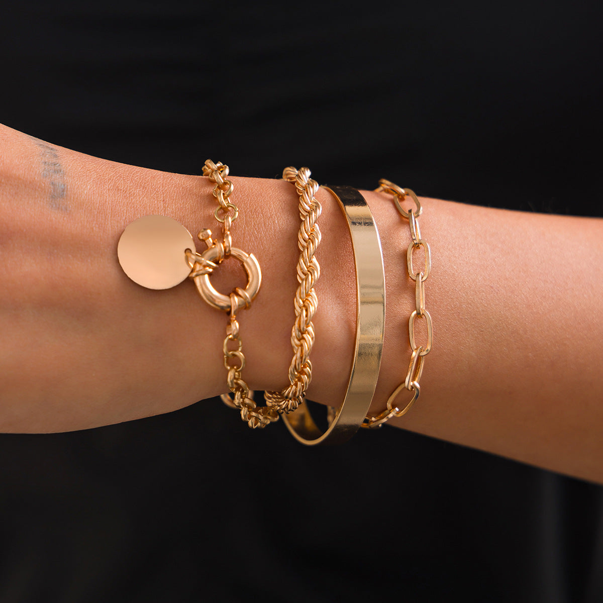 Disc gold bracelet set