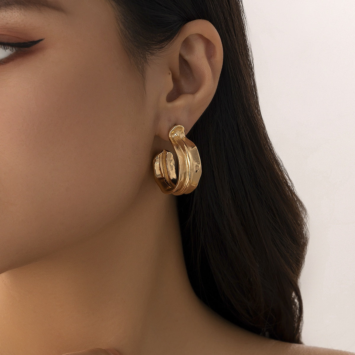 Gold Curved hollow earrings