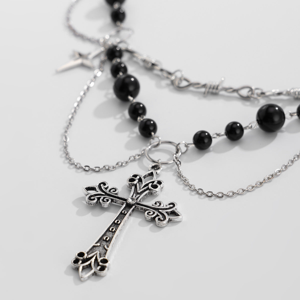 cross in necklace