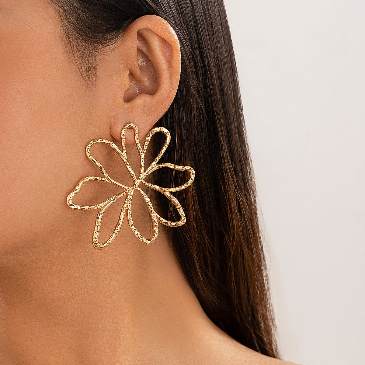 flower shaped gold drop earrings