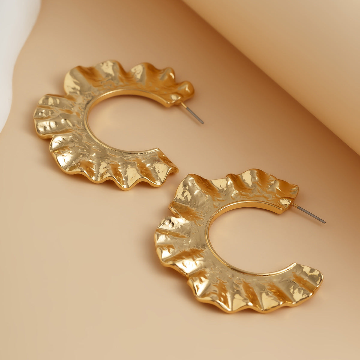 Gold hollow earrings